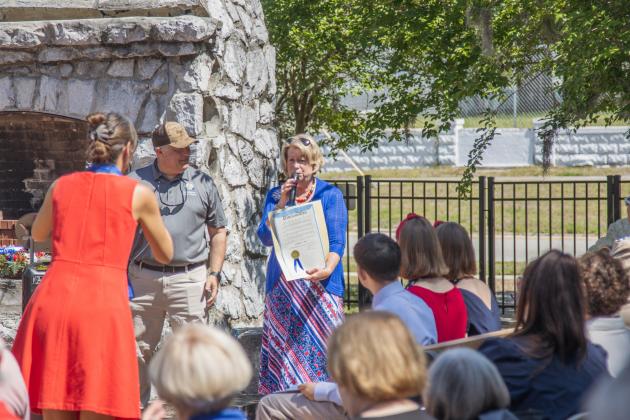Vice-Mayor Darron Ayscue presents the American 250! proclamation to Diane Hishta, regent for the Amelia Island Chapter of the National Society Daughters of American Revolution.  Photo by Ashley Chandler/News-Leader