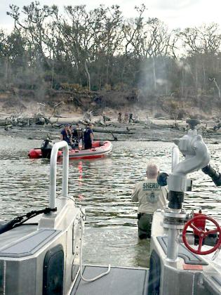 Nassau County first responders assisted in transporting an injured woman on the water Sunday at Boneyard Beach. Submitted