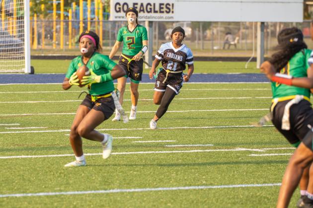 Kenia Huguley carries the ball in Tuesday's district tournament game. Photo by Nick Blank/News-Leader