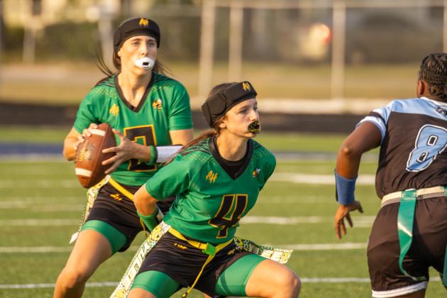 Harlow Smith screen blocks for quarterback Brooke Reid in Tuesday’s district game against Ribault. Photo by Nick Blank/News-Leader