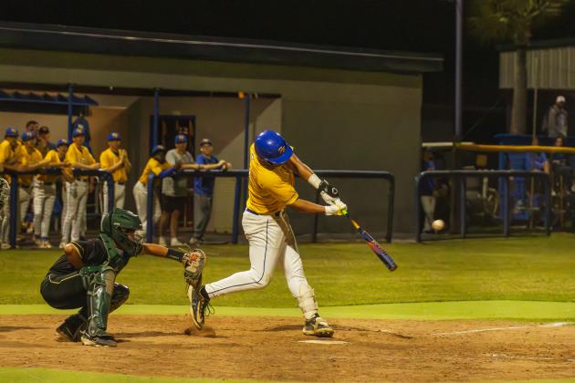 Trace Farmer hits an RBI double for Fernandina Beach High School in a game Friday against Fleming Island. Photo by Ashley Chandler/News-Leader