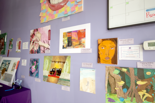 The student art work on display at Micah’s Place’s Purple Dove Resale Center in Fernandina Beach for the teen art contest.  By Marisa DeMar/News-Leader 