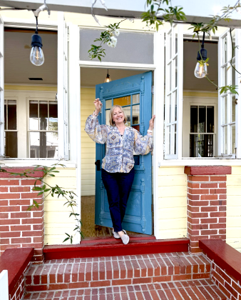  Tonya Blanchford poses outside the location of her Coastal Tea Cafe on South 5th Street in Downtown Fernandina Beach after closing on the property earlier this month.  Submitted Photo 