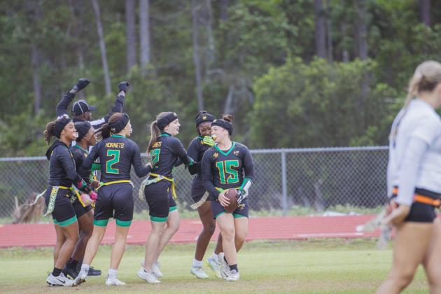 Hornets celebrate after Myla Smith’s touchdown early in Wednesday’s contest. Photo by Nick Blank/News-Leader