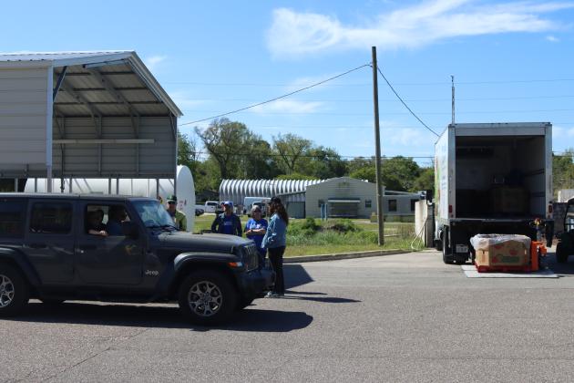 A Barnabas food drive was held Saturday alongside the Household Hazardous Waste Collection in Fernandina Beach, as well as the coinciding event in Yulee. Photo by Ashley Chandler/News-Leader