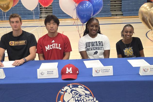 Camilla Clarke, second from right, a high school student at Bolles High School in Jacksonville, and resident of Fernandina Beach, participated in a signing ceremony Wednesday at Bolles. Clarke has committed to throw for the Howard University track and field team. Submitted photo