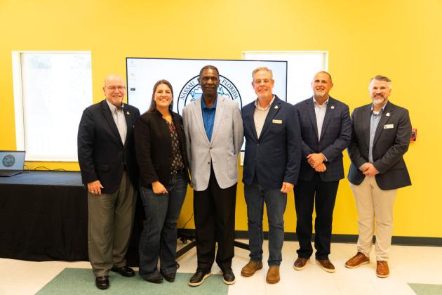 From left, Commissioner John Martin; Commissioner Alyson McCullough; Ervin Gilyard, Chairman of the American Beach Water &amp; Sewer District Advisory Board; Commissioner A.M. "Hupp" Huppmann; Assistant County Manager Marshall Eyerman; and Clerk of Courts Mitch Keiter. Submitted photo