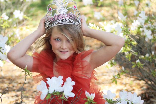 Laylah Saylor Leopold poses in her queen crown and sash which were awarded to her when she took first place in the Sunburst Pageant in Orange Park in Feb.  By Marisa DeMar/News-Leader