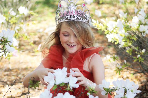 Laylah Saylor Leopold poses in her queen crown and sash which were awarded to her when she took first place in the Sunburst Pageant in Orange Park in Feb.  By Marisa DeMar/News-Leader