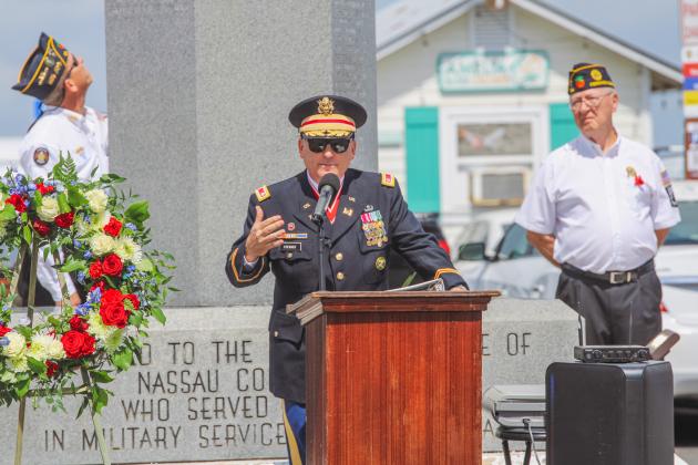 Retired Army Lt. Col. Montieth Stewart speaks to hundreds gathered on Centre Street for Memorial Day on Monday. Nick Blank/News-Leader