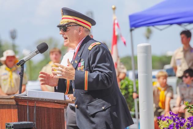 Retired Army Lt. Col. Montieth Stewart speaks to hundreds gathered on Centre Street for Memorial Day on Monday. Nick Blank/News-Leader
