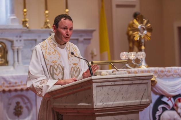Father Eric Stelzer speaks at St. Michael’s Catholic Church. By Nick Blank/News-Leader