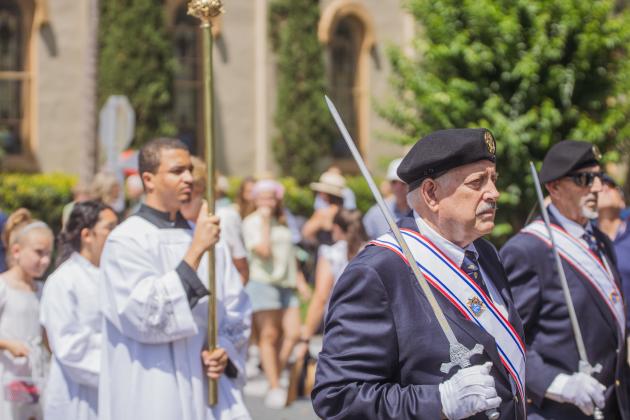 Clergy from St. Michael’s Catholic Church walk to the Fernandina Harbor Monday for the National Eucharistic Pilgrimage. Nick Blank/News-Leader