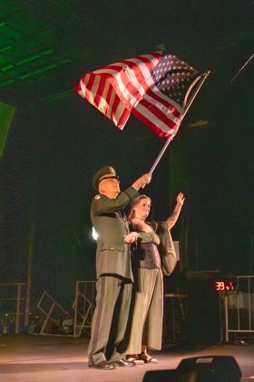 The Invasion of the Pirates on Friday closed out with Princess Amelia, coming back to the stage, escorted by U.S. veteran Lt. Col. Craig Goodall. Photo by Ashley Chandler/News-Leader