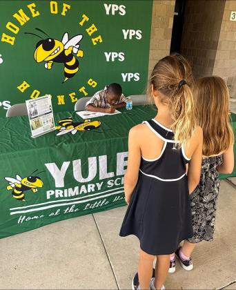 Yulee Primary School held a book-signing event for their resident author Amari Bryant, a first-grader at the school. Bryant signed copies of his book, Going Camping. Submitted