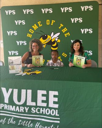 Yulee Primary School held a book-signing event for their resident author Amari Bryant, a first-grader at the school. Bryant signed copies of his book, Going Camping. Submitted