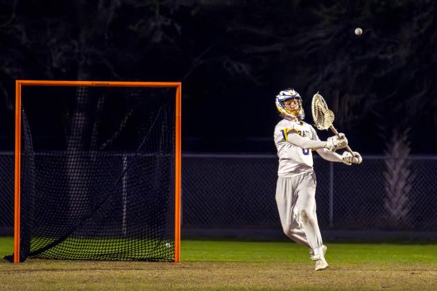 Dominic Cortes in a Pirates Lacrosse game this past season. Photo by Ashley Chandler/News-Leader