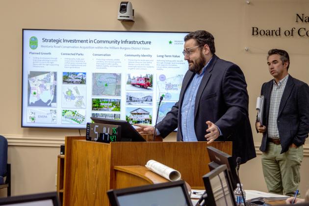 Senior Planner Joshua Macbeth speaks at the April 27 Board of County Commissioners meeting about the planning behind the 223 acres the county purchased for conservation purposes. Photo by Ashley Chandler/News-Leader