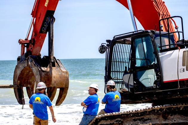 Maverick Marine Services brings the vessel, Coco, onto the beach on Fernandina Beach near Beach Access 16N.  Nick Blank/News-Leader