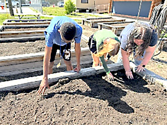 FBMS students plant flowers and vegetables in raised beds to beautify the campus and learn more about plants. Submitted photo