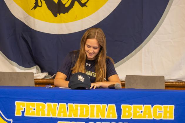 Sarah Benjamin signs her letter of intent to play soccer at New College of Florida. Photo by Ashley Chandler/News-Leader