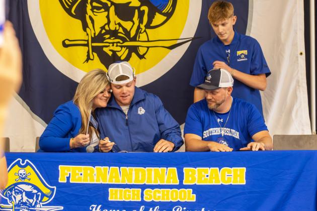 Lucas Hutchinson signed his letter of intent to play baseball at Southern Wesleyan University. Photo by Ashley Chandler/News-Leader