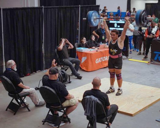 Yulee High School’s Turtle Ricks competes in the FHSAA Weightlifing State Championships last week. Ricks placed first in Olympic Weightlifting and third in Traditional Weightlifting. Photos by Hitsquad Media