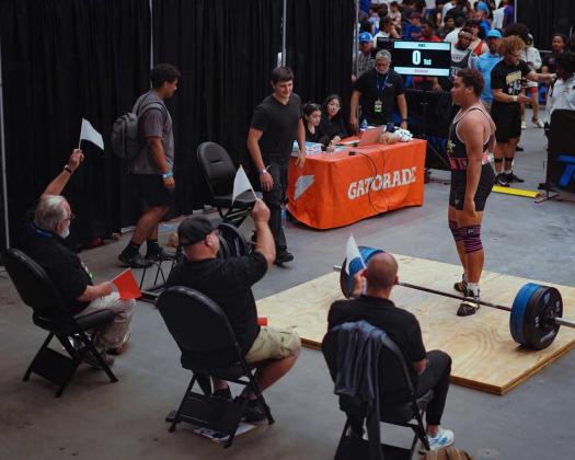 Yulee High School’s Turtle Ricks competes in the FHSAA Weightlifing State Championships last week. Ricks placed first in Olympic Weightlifting and third in Traditional Weightlifting. Photos by Hitsquad Media