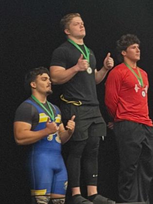 Gabe Marquez, left, came in third place in Traditional at the State Championships for the 219-pound weight class. Submitted photo