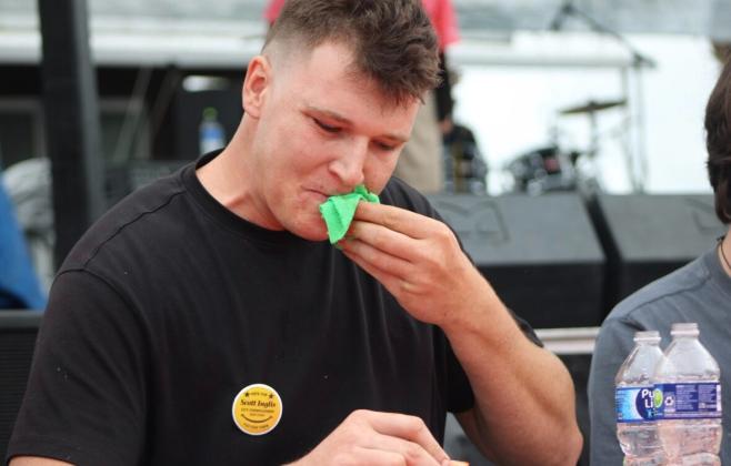 The shrimp eating contest was held Saturday at the 61st Annual Shrimp Festival. Photo by Marisa DeMar/News-Leader