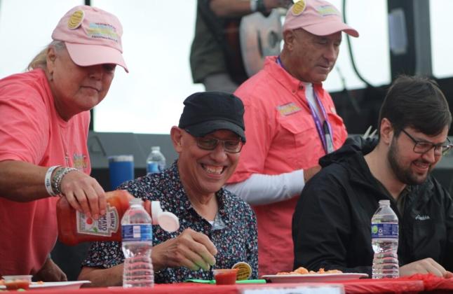 The shrimp eating contest was held Saturday at the 61st Annual Shrimp Festival. Photo by Marisa DeMar/News-Leader