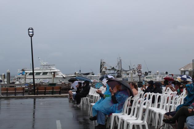 The Fernandina Beach High School Jazz Ensemble performed in the rain Saturday morning at the 61st annual Eight Flags Shrimp Festival. Photo by Amy Mulligan/News-Leader
