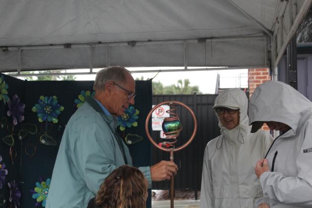 Shrimp Fest gets rained on Saturday. Photo by Amy Mulligan/News-Leader