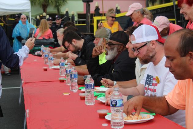 The shrimp eating contest was held Saturday at the 61st Annual Shrimp Festival. Photo by Amy Mulligan/News-Leader