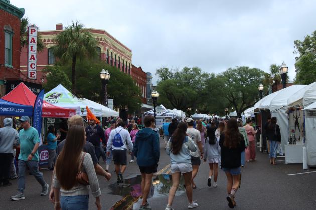 Shrimp Fest continues after the rain on Saturday. Photo by Ashley Chandler/News-Leader