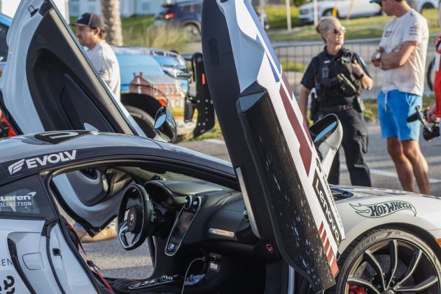 The Gumball 3000 rolls through Main Beach Park. Photo by Ashley Chandler/News-Leader