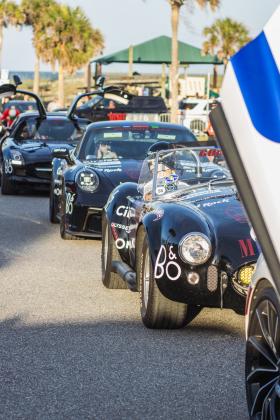 The Gumball 3000 rolls through Main Beach Park. Photo by Ashley Chandler/News-Leader