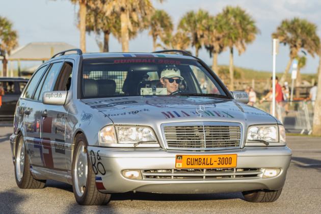 The Gumball 3000 rolls through Main Beach Park. Photo by Ashley Chandler/News-Leader