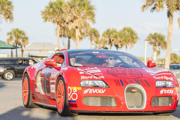 The Gumball 3000 rolls through Main Beach Park. Photo by Ashley Chandler/News-Leader