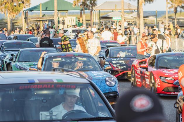 The Gumball 3000 rolls through Main Beach Park. Photo by Ashley Chandler/News-Leader