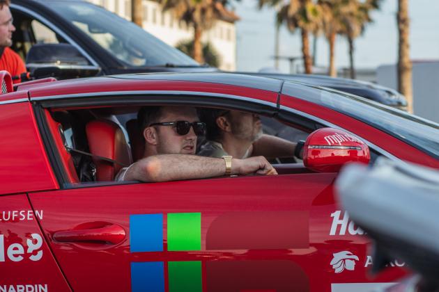 The Gumball 3000 rolls through Main Beach Park. Photo by Ashley Chandler/News-Leader
