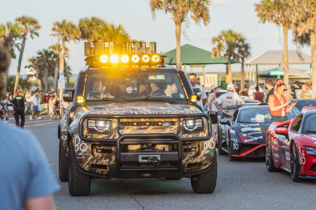 The Gumball 3000 rolls through Main Beach Park. Photo by Ashley Chandler/News-Leader
