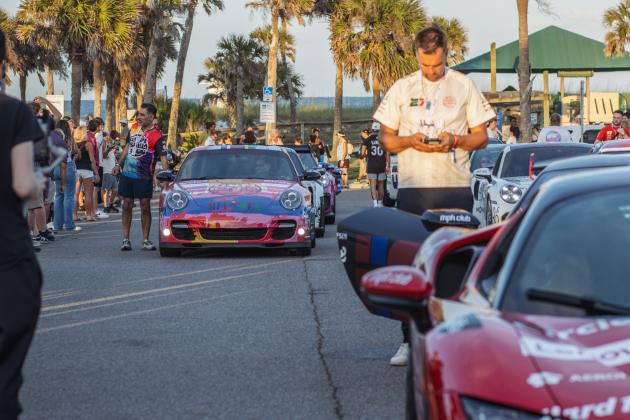 The Gumball 3000 rolls through Main Beach Park. Photo by Ashley Chandler/News-Leader