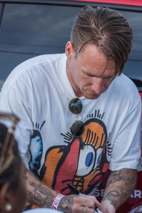 UK street artist Slawn signs autographs at the Poe Pinson Skate Park. Photo by Ashley Chandler/News-Leader