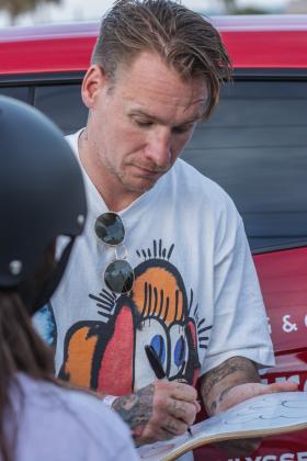 UK street artist Slawn signs autographs at the Poe Pinson Skate Park. Photo by Ashley Chandler/News-Leader