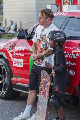 UK street artist Slawn poses for a photo with a local youth at the Poe Pinson Skate Park. Photo by Ashley Chandler/News-Leader