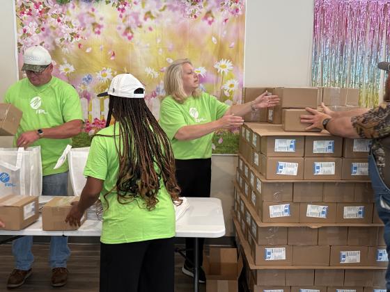 At the Nassau County Council on Aging’s Westside Senior Life Center in Hilliard, about 20 seniors received hurricane kits packed by Florida Power &amp; Light workers, NCCOA staff and volunteers. Nick Blank/News-Leader