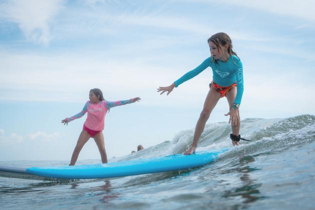 Local youth take part in the Amelia Island Surf Co. summer surf camp.  Photo by Brian Bowen