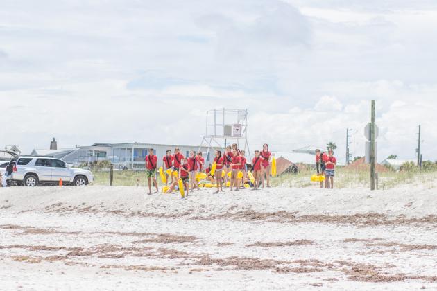 Participants of the Junior Lifeguard Camp take park in an exercise Wednesday at Seaside Park. The first weeklong session of the camp was held this week. Photo by Ashley Chandler/News-Leader