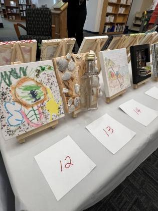The Friends of the Library is hosting its Tiny Art! Big Fun! Art Contest, featuring more than 40 miniature works created by local artists. The exhibition is currently on display at the library and invites visitors to vote for their favorite pieces through June 26. Photo by Amy Mulligan/News-Leader